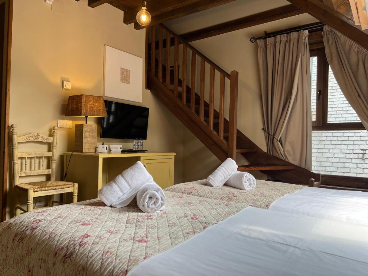 Cama o camas de una habitación en Tierras De Arán