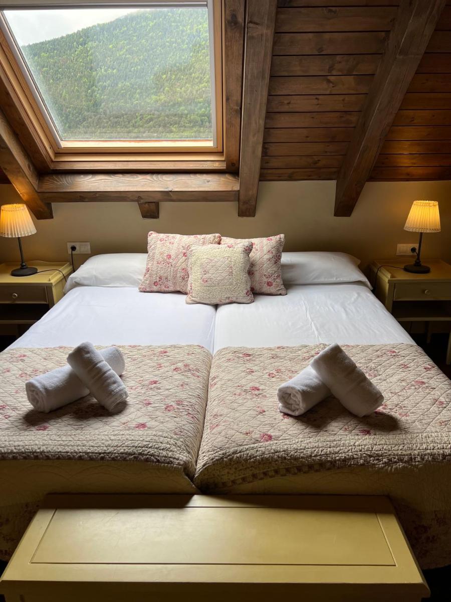 Cama o camas de una habitación en Tierras De Arán