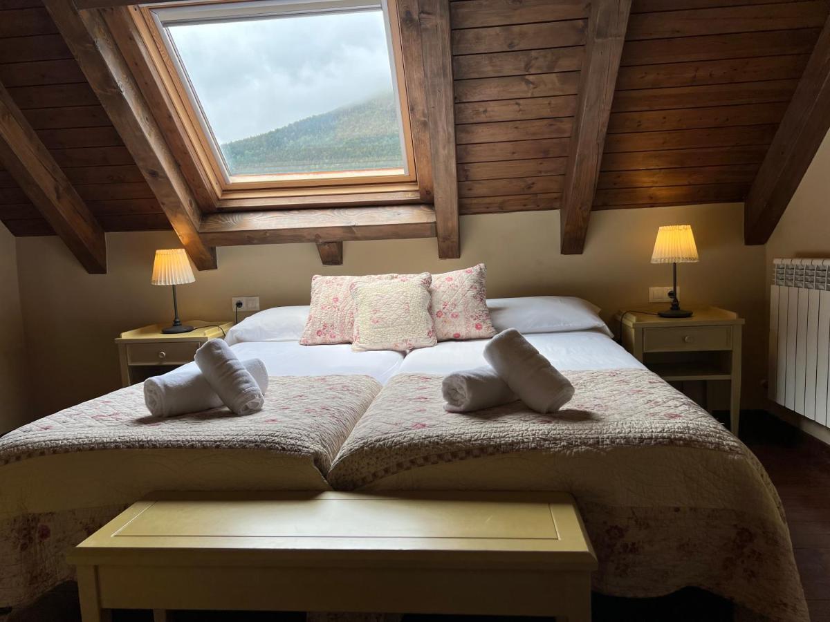 Cama o camas de una habitación en Tierras De Arán