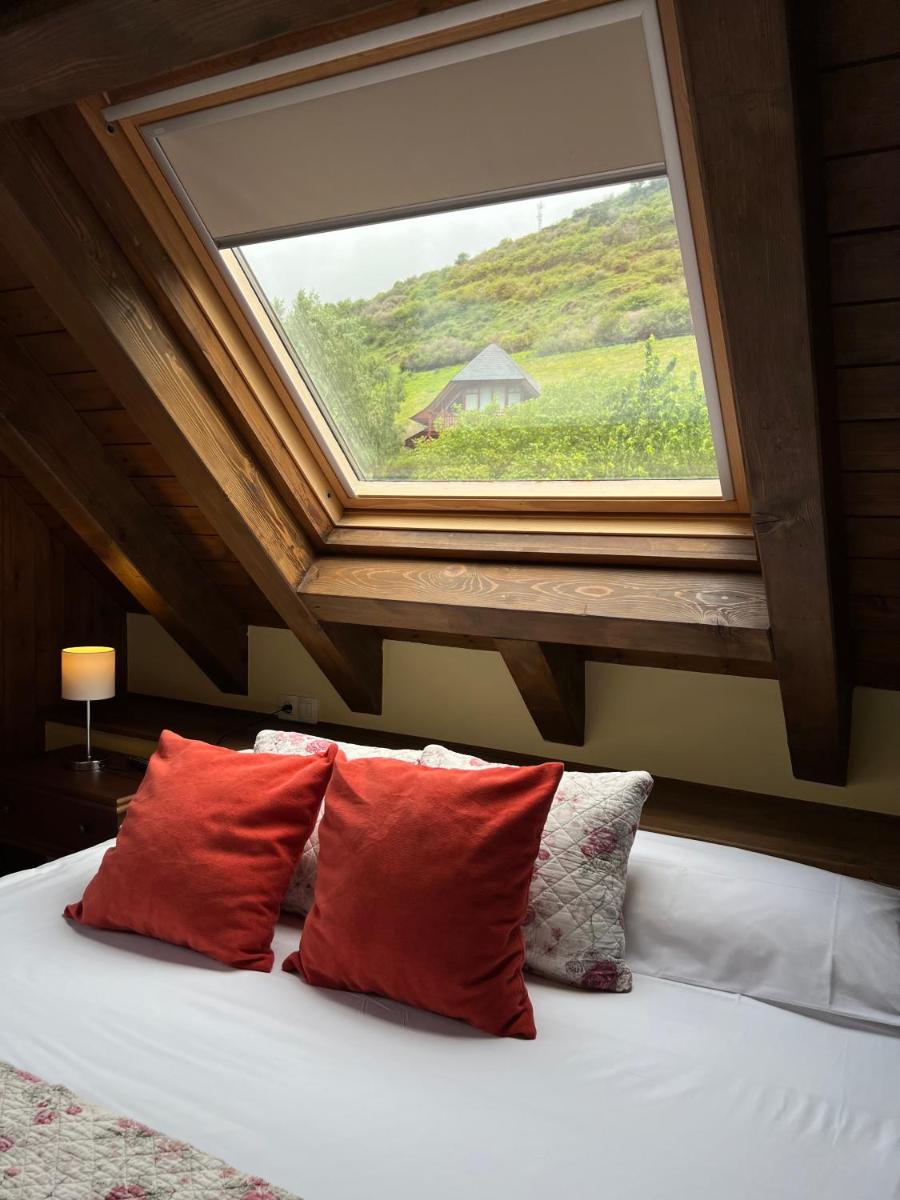 Cama o camas de una habitación en Tierras De Arán