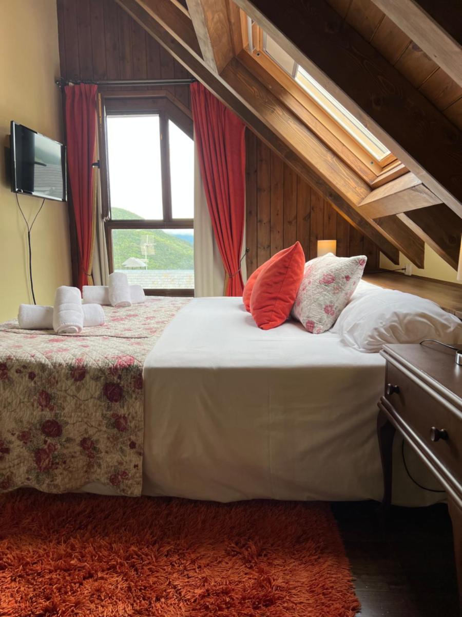 Cama o camas de una habitación en Tierras De Arán