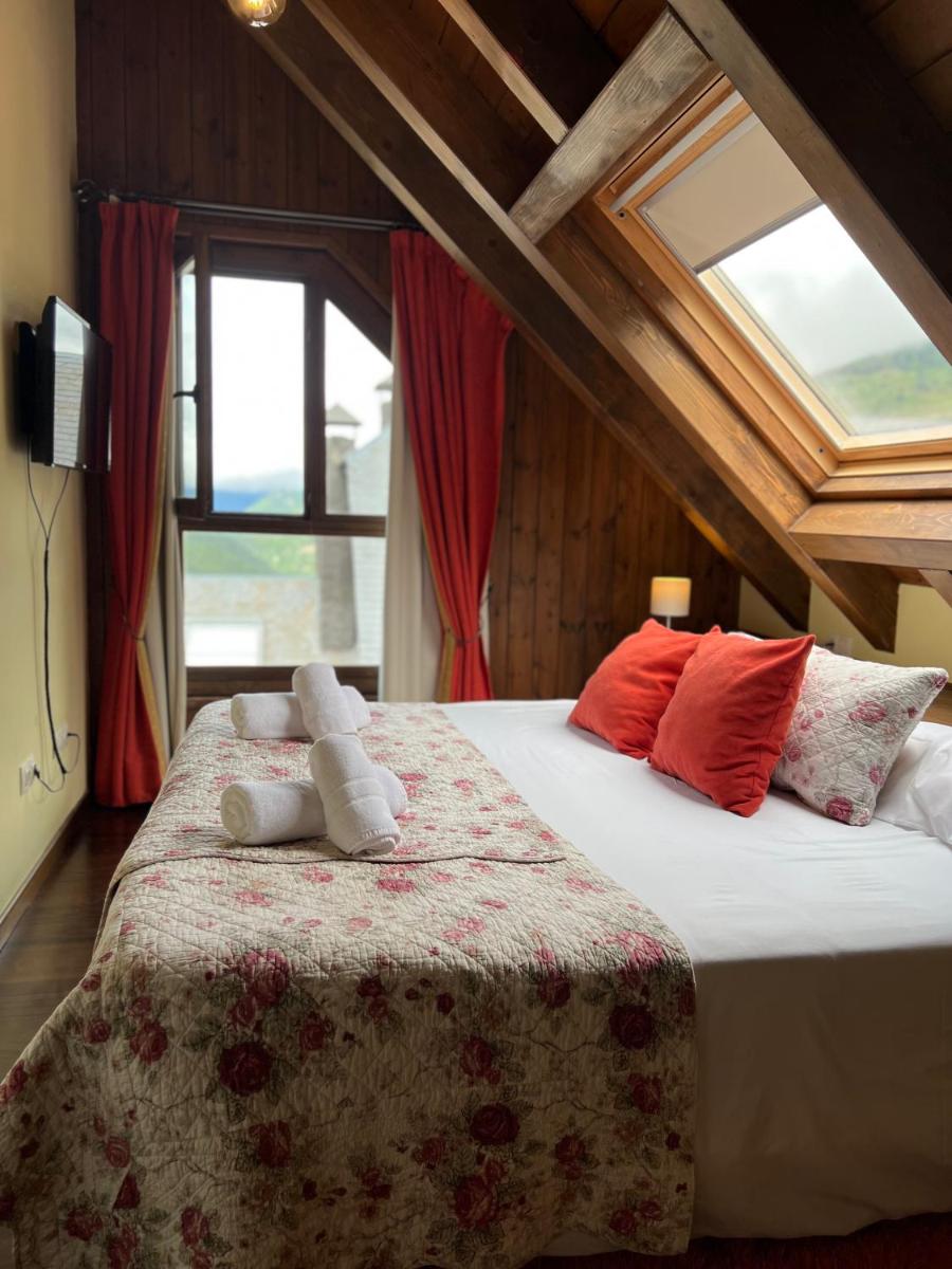 Cama o camas de una habitación en Tierras De Arán