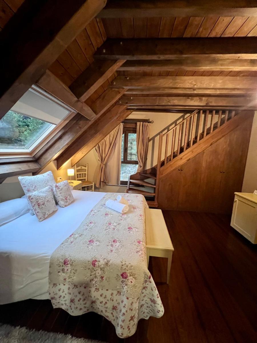 Cama o camas de una habitación en Tierras De Arán