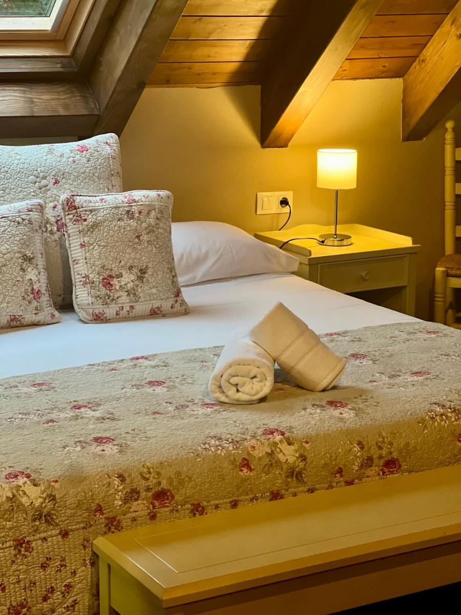Cama o camas de una habitación en Tierras De Arán
