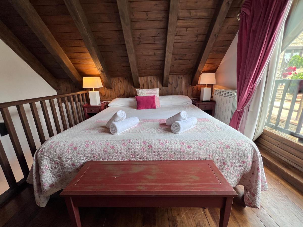 Cama o camas de una habitación en Tierras De Arán