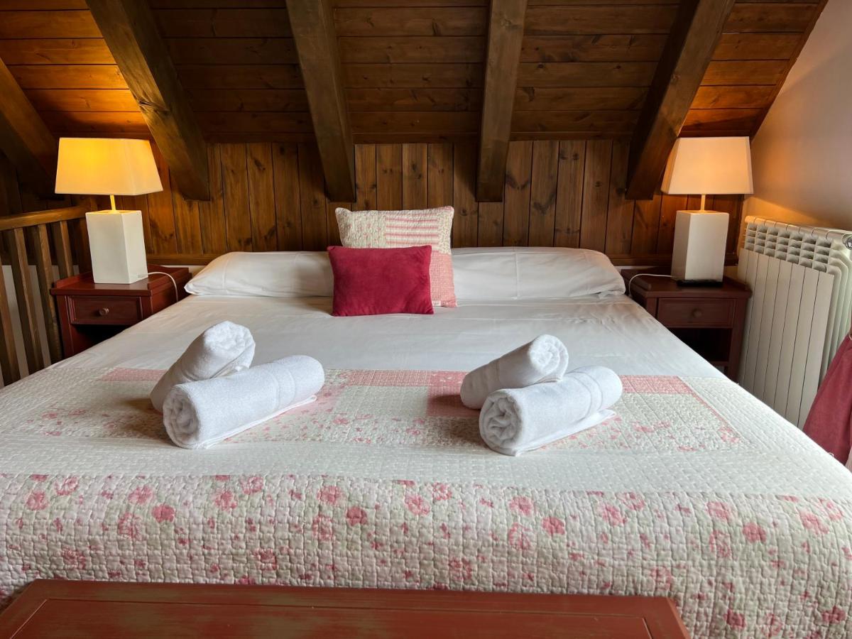 Cama o camas de una habitación en Tierras De Arán