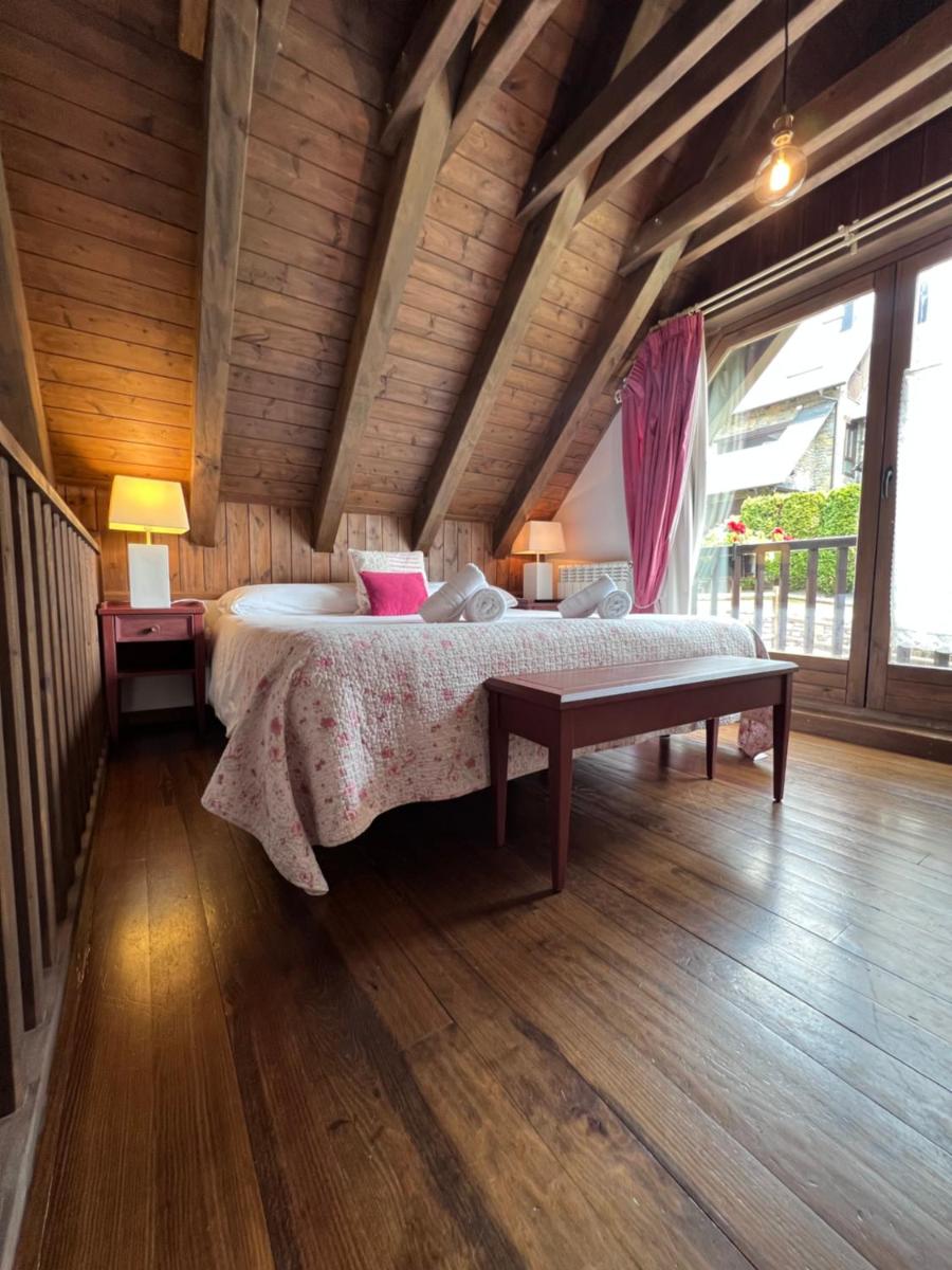 Cama o camas de una habitación en Tierras De Arán