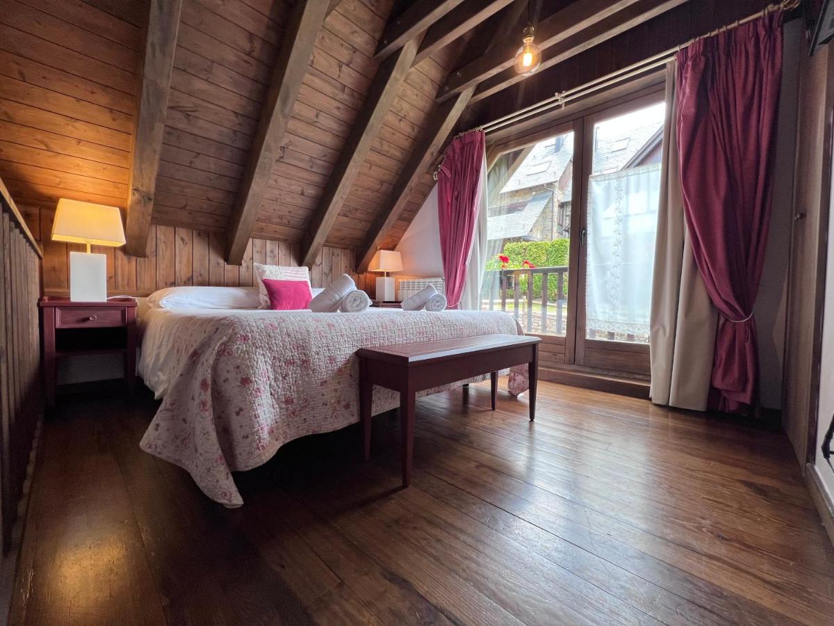 Cama o camas de una habitación en Tierras De Arán