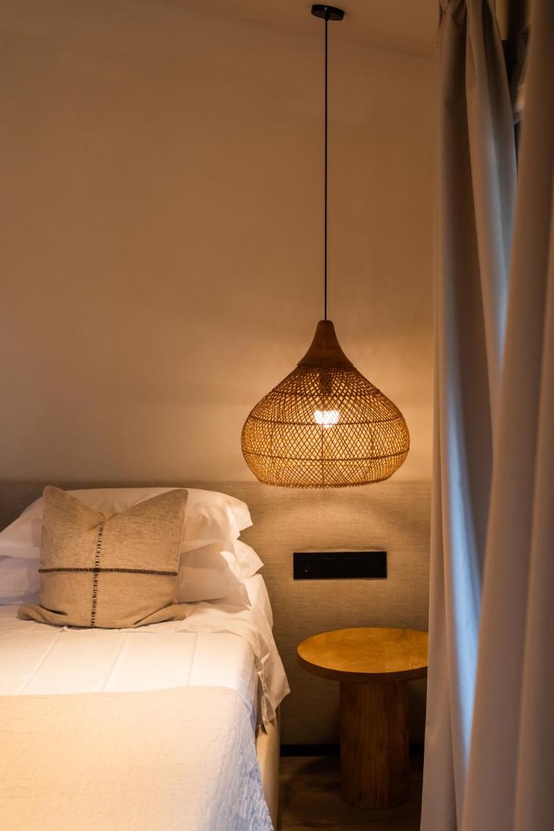 Uma cama ou camas num quarto em DOMA Portugal