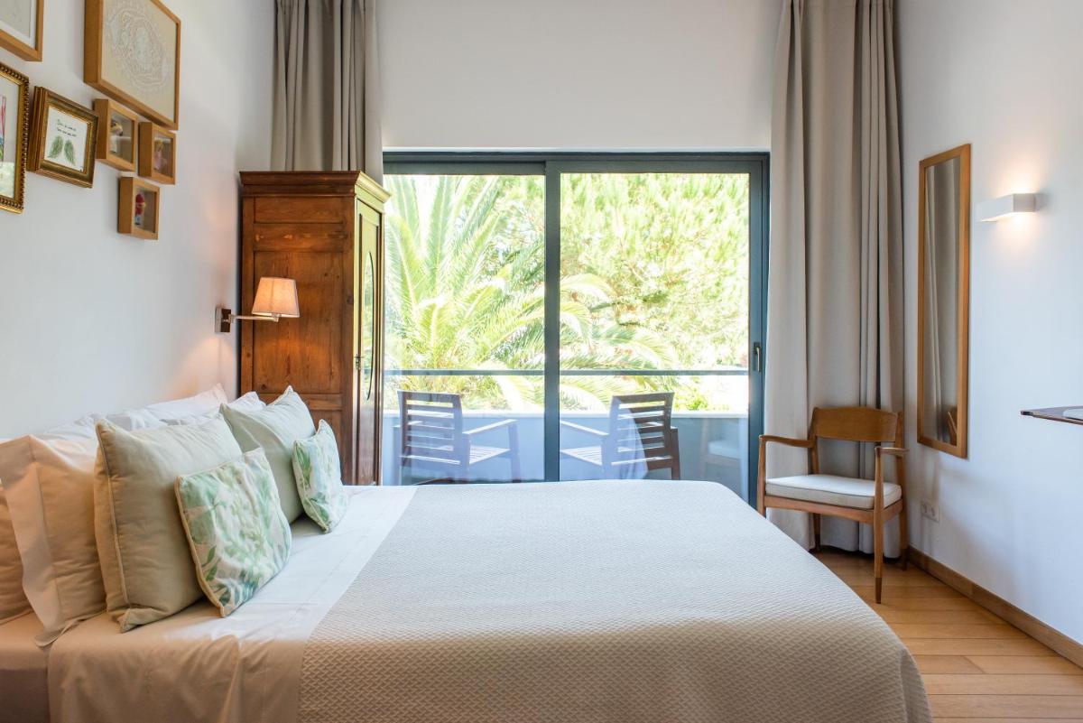 Uma cama ou camas num quarto em DOMA Portugal