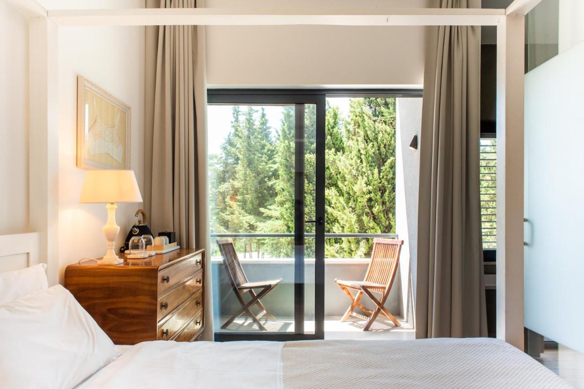 Uma cama ou camas num quarto em DOMA Portugal