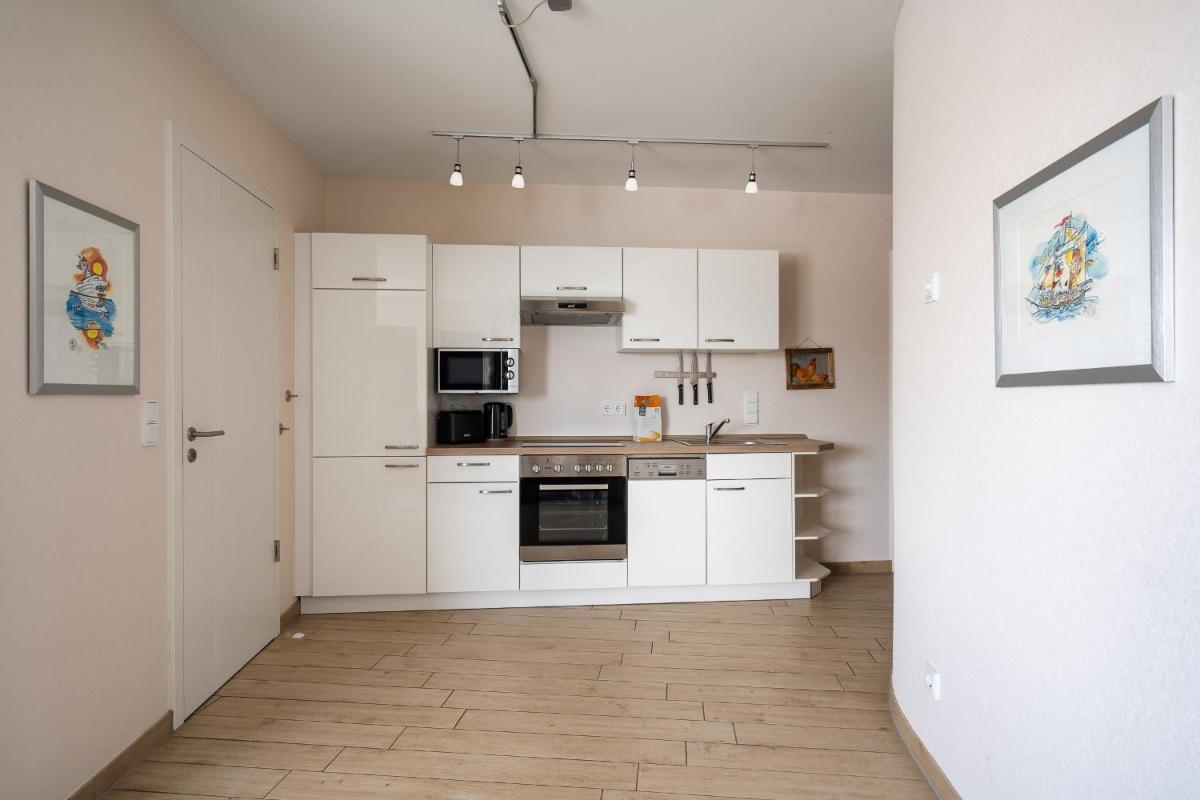 Panorama Suite mit Balkon und Müritzblick - Housity