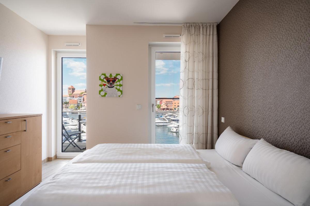 Panorama Suite mit Balkon und Müritzblick - Housity