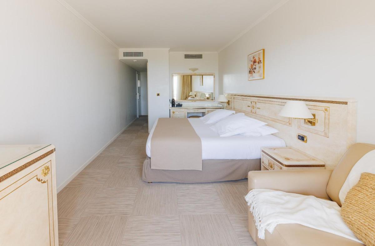 Un ou plusieurs lits dans un hébergement de l'établissement Hotel Corsica & Spa Serena