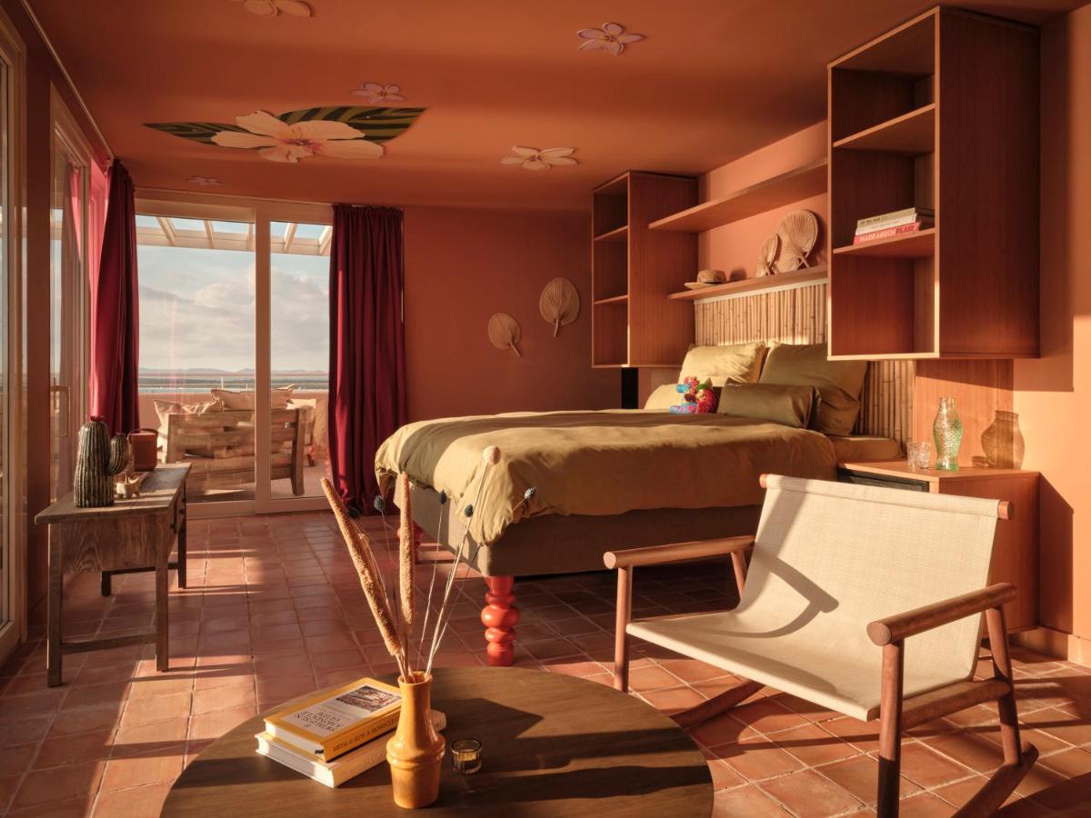 Cama o camas de una habitación en Bikini Island & Mountain Hotel Es Trenc -Adults only-