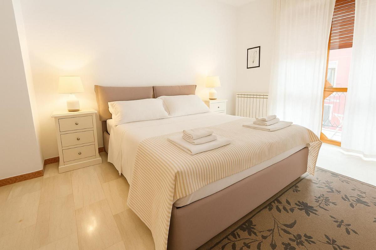 Frangipani HOUSE Cagliari luxury huge apartment city center with lift - Hizvo
