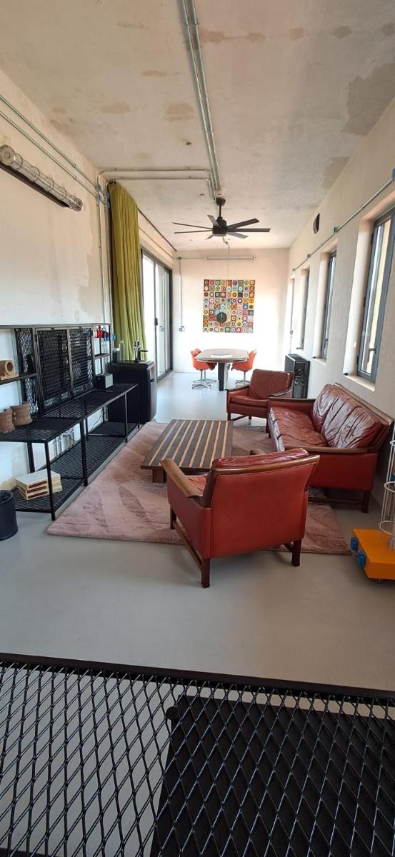 Uma cama ou camas num quarto em Moagem Industrial Lodge