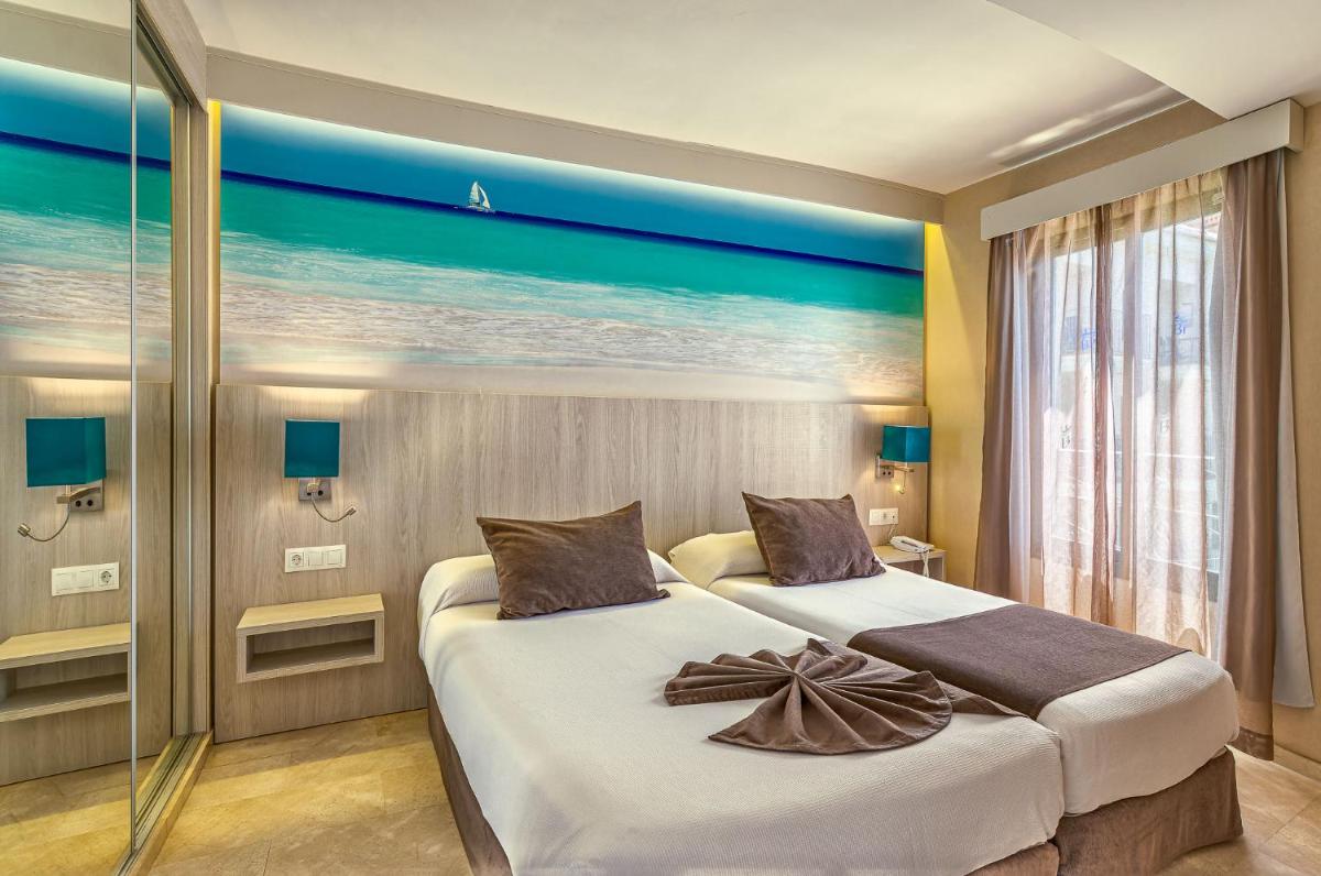 Cama o camas de una habitación en Benalmadena Palace Spa