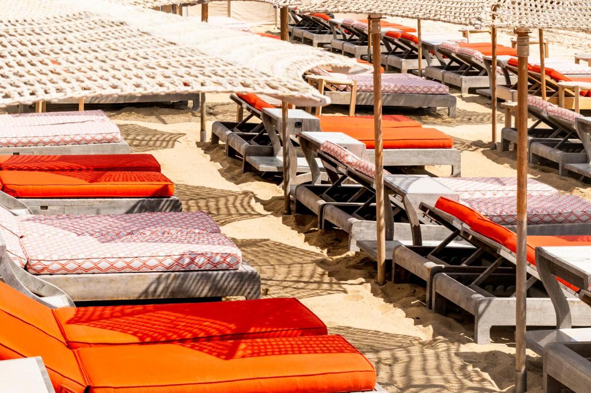 Un ou plusieurs lits dans un hébergement de l'établissement Hotel Byblos Saint-Tropez