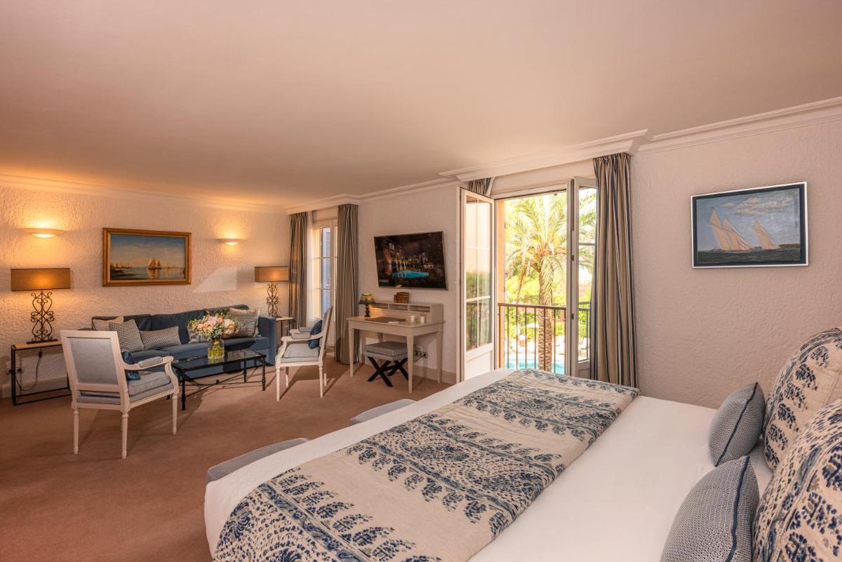 Un ou plusieurs lits dans un hébergement de l'établissement Hotel Byblos Saint-Tropez