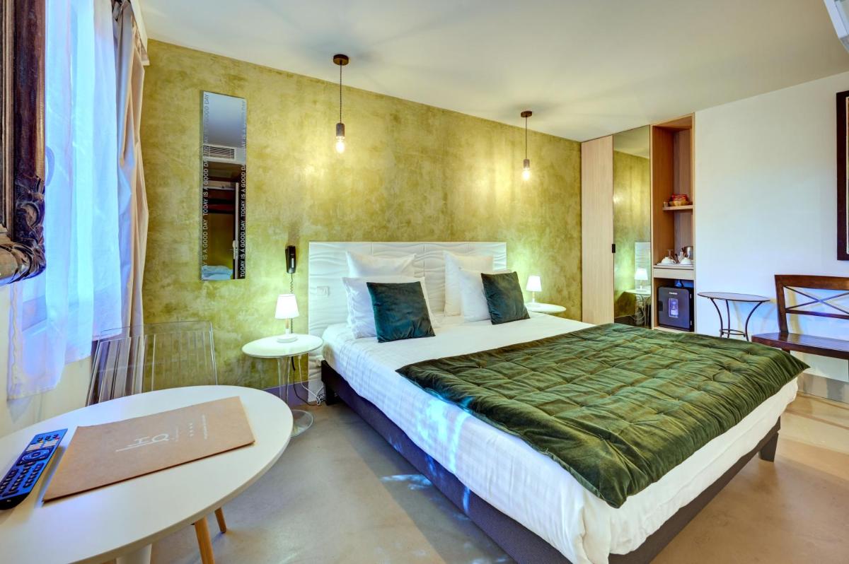 Un ou plusieurs lits dans un hébergement de l'établissement Hotel Bastide & SPA - Villa de Lourmarin