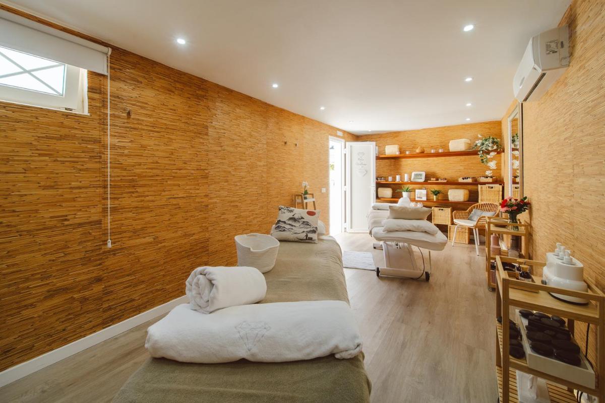 Zona de estar de Lani's Suites de Luxe - Adults Only