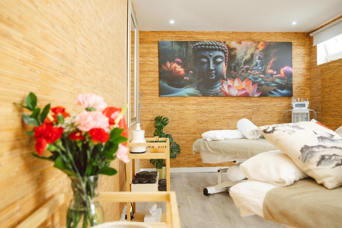 Zona de estar de Lani's Suites de Luxe - Adults Only