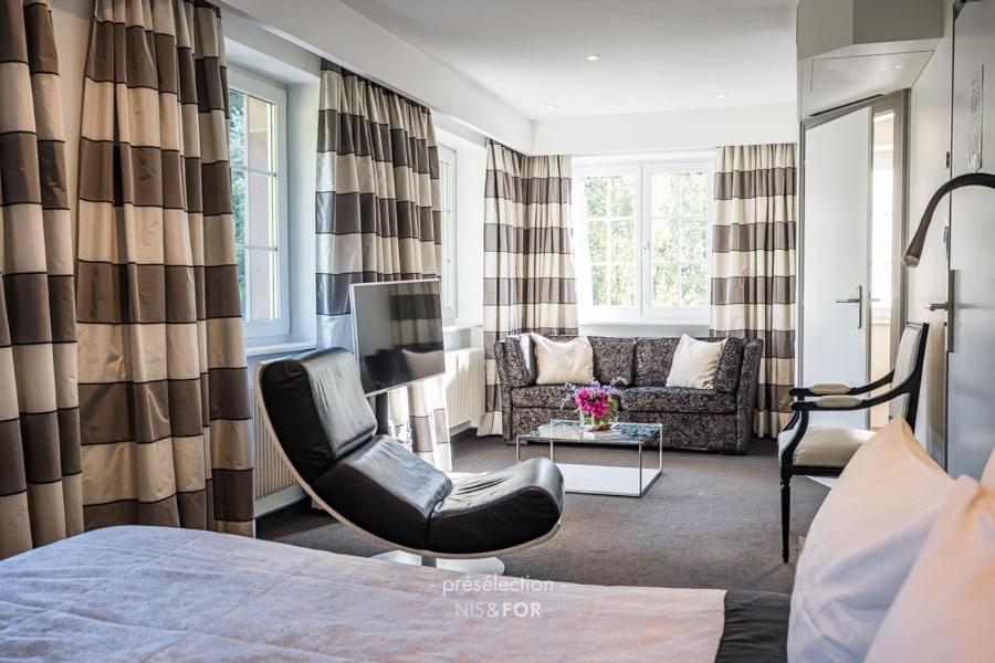 Coin salon dans l'établissement 6717 Nature Hôtel & Spa Le Clos des Délices