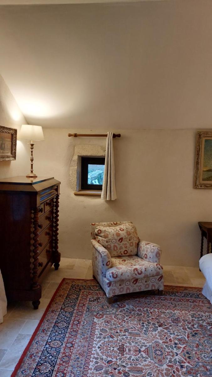 Télévision ou salle de divertissement dans l'établissement Château de Maillat