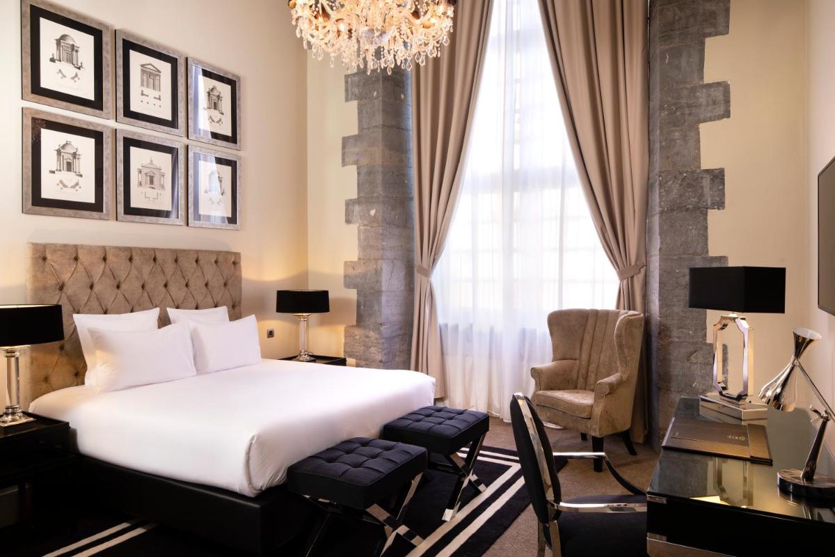 Un ou plusieurs lits dans un hébergement de l'établissement Royal Hainaut Spa & Resort Hotel