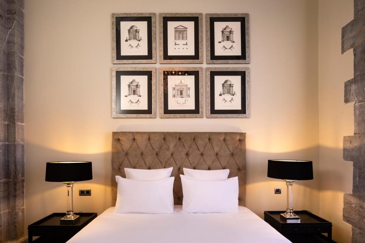 Un ou plusieurs lits dans un hébergement de l'établissement Royal Hainaut Spa & Resort Hotel