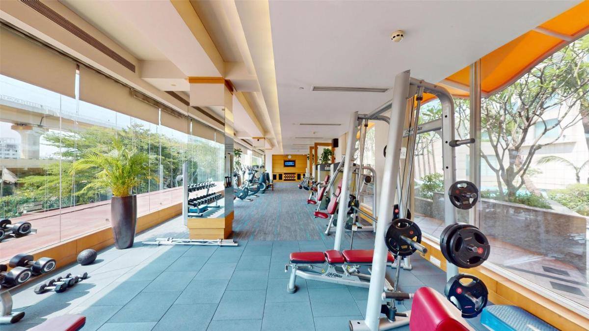 a gym with cardio equipment in a building at Radisson Blu Hotel, Nagpur in Nagpur