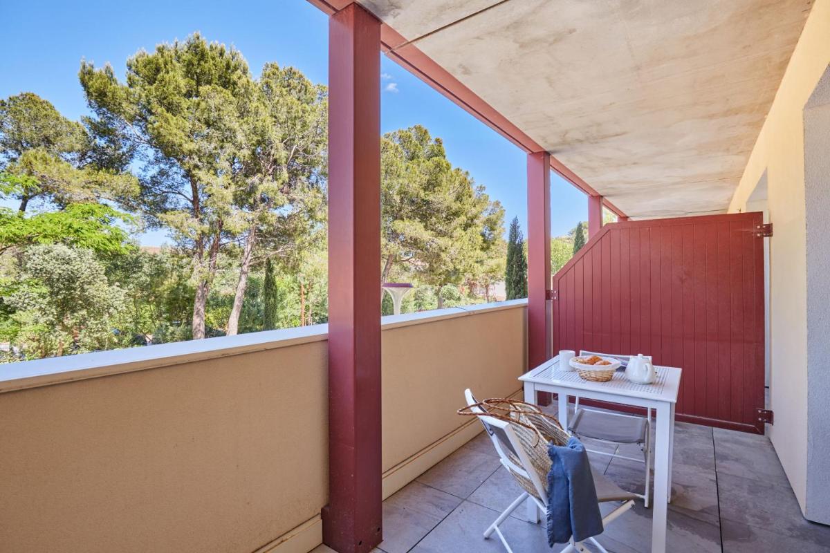 Balcon ou terrasse dans l'établissement Résidence Odalys Les Canissons
