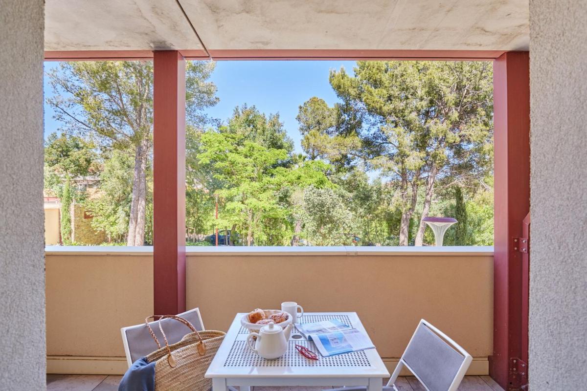 Balcon ou terrasse dans l'établissement Résidence Odalys Les Canissons