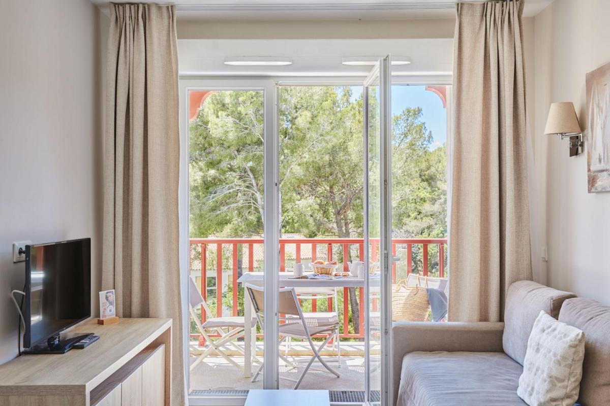 Balcon ou terrasse dans l'établissement Résidence Odalys Les Canissons