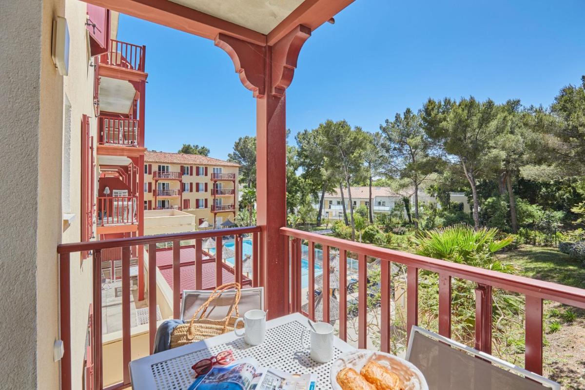 Balcon ou terrasse dans l'établissement Résidence Odalys Les Canissons