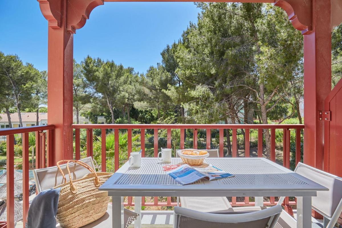 Balcon ou terrasse dans l'établissement Résidence Odalys Les Canissons