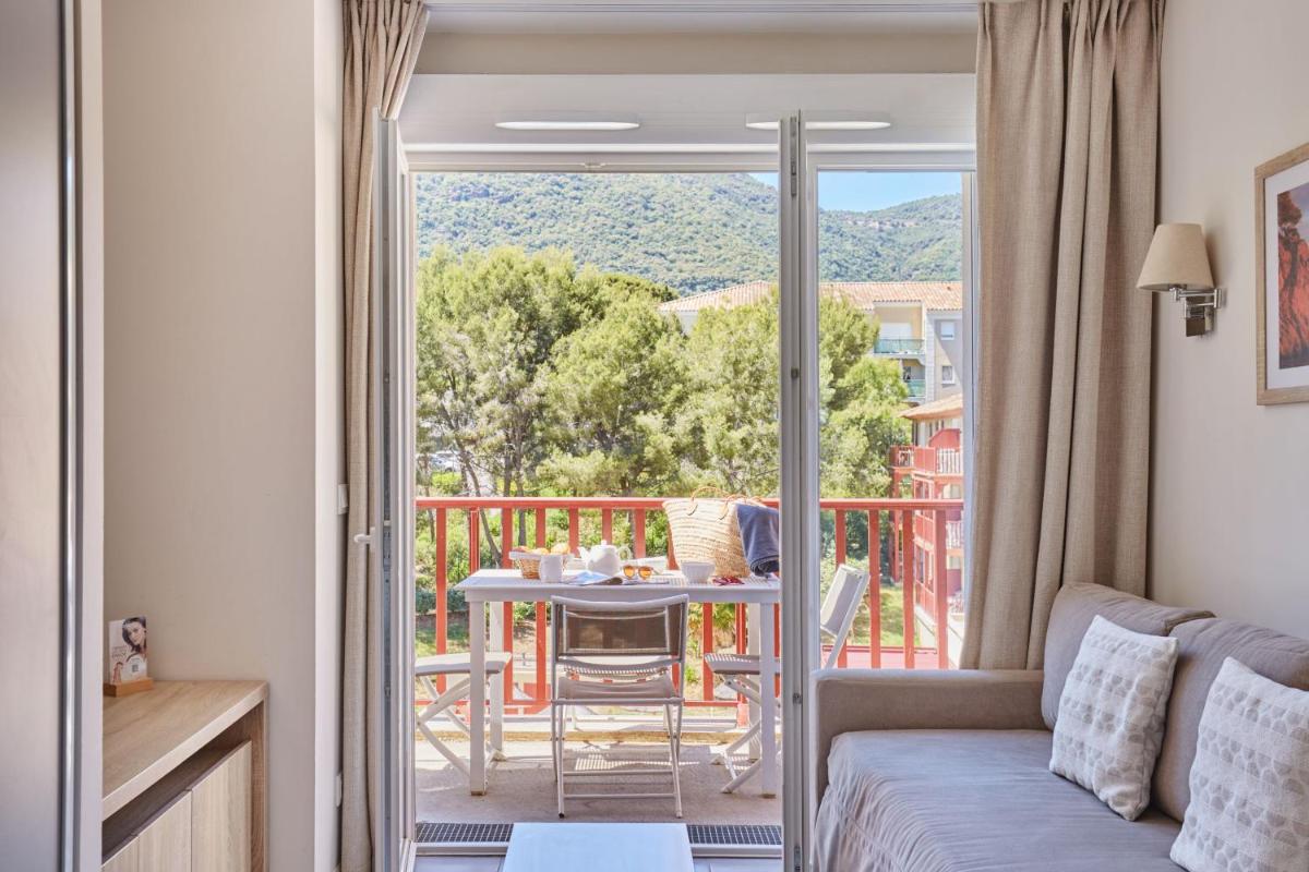 Balcon ou terrasse dans l'établissement Résidence Odalys Les Canissons