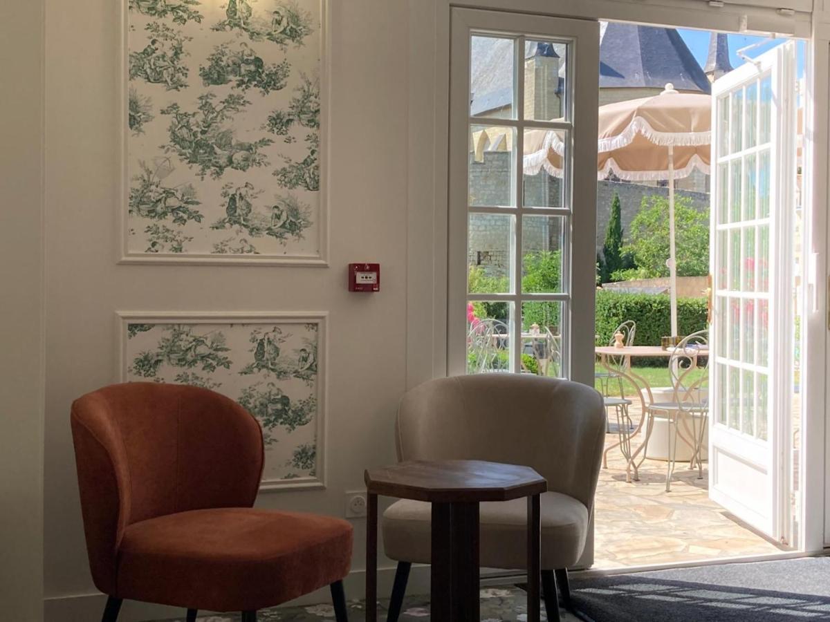 Coin salon dans l'établissement Le Relais du Bellay