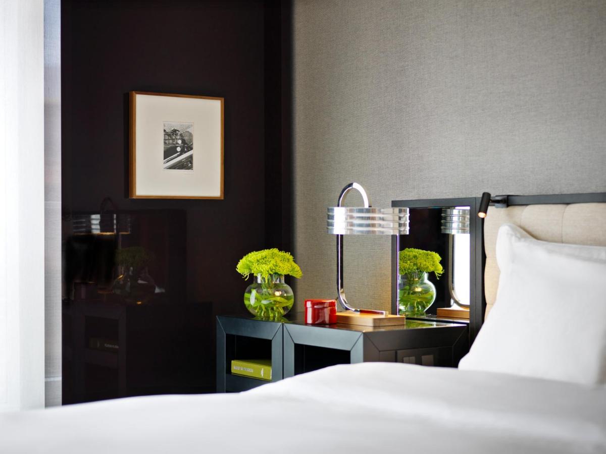 Ein Bett oder Betten in einem Zimmer der Unterkunft Grand Hyatt Berlin