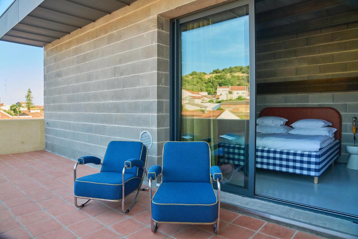 Uma varanda ou terraço em Moagem Industrial Lodge