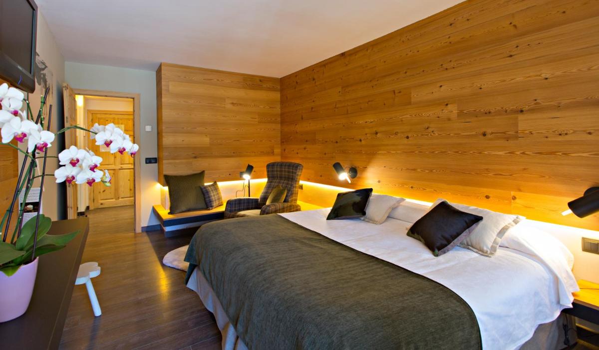 Cama o camas de una habitación en Hotel La Coma