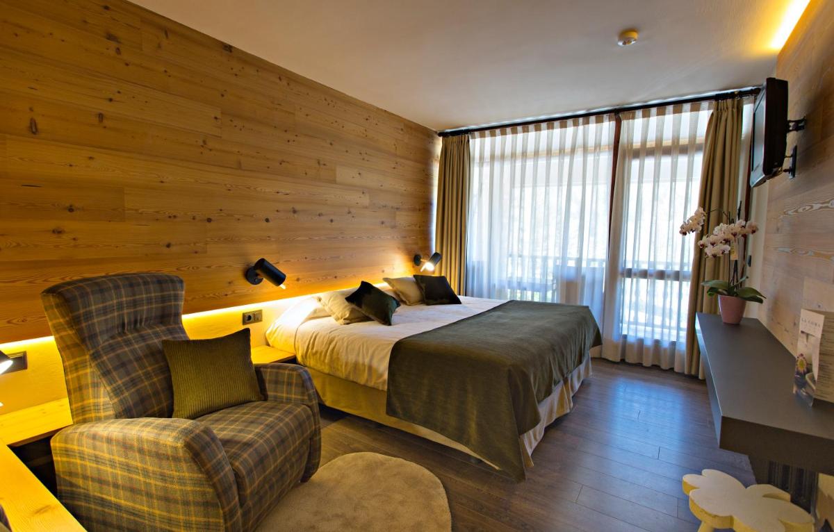 Cama o camas de una habitación en Hotel La Coma