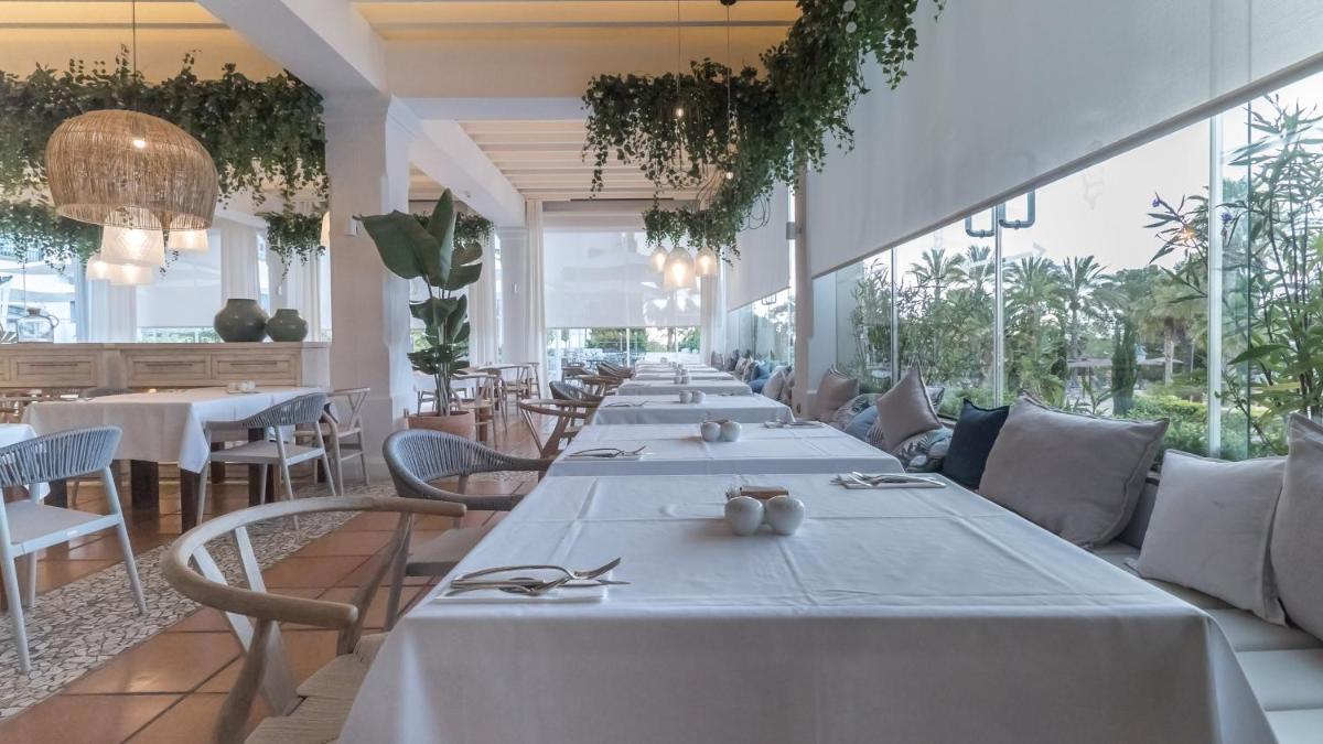 Un restaurante o sitio para comer en SH Villa Gadea