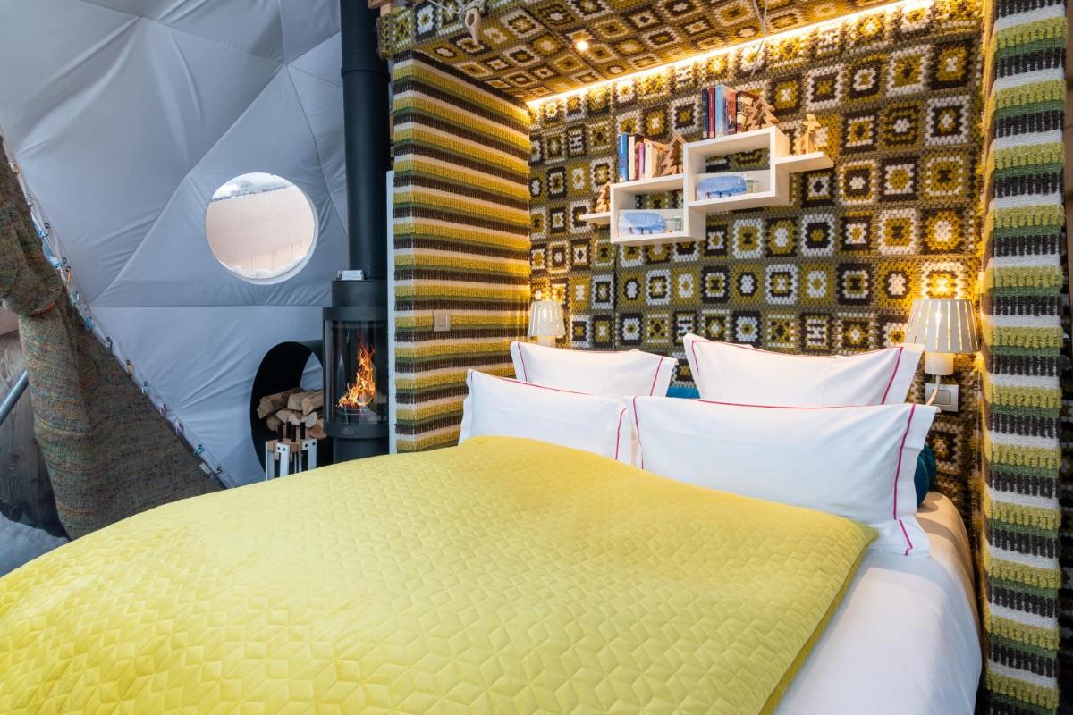 Un ou plusieurs lits dans un hébergement de l'établissement Hotel Pashmina Le Refuge