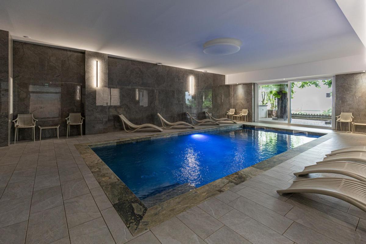 Piscine de l'établissement Hotel Munsch Restaurant & Wellness, Colmar Nord - Haut-Koenigsbourg ou située à proximité