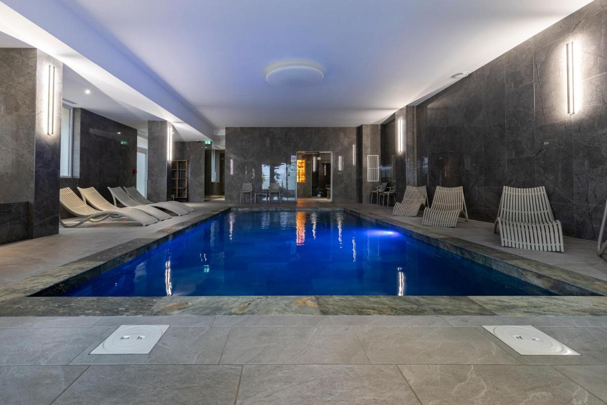 Piscine de l'établissement Hotel Munsch Restaurant & Wellness, Colmar Nord - Haut-Koenigsbourg ou située à proximité