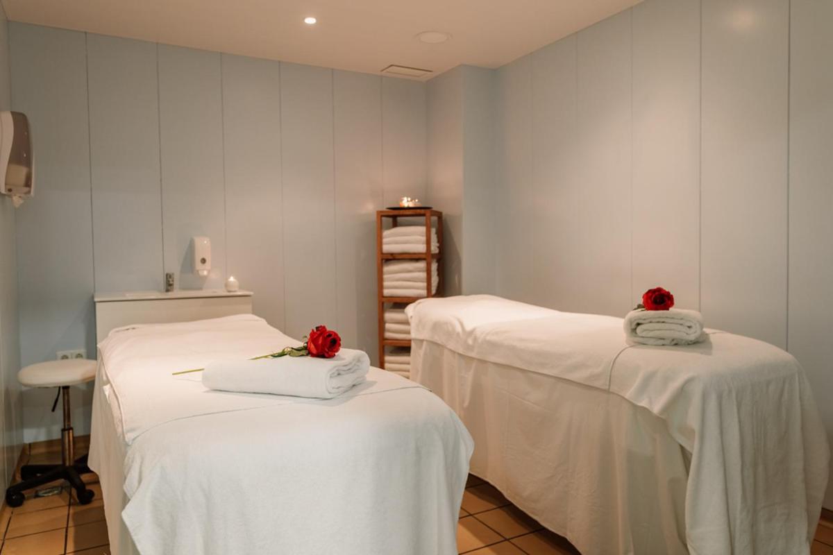 Cama o camas de una habitación en Hotel Lodomar Spa & Talasoterapia