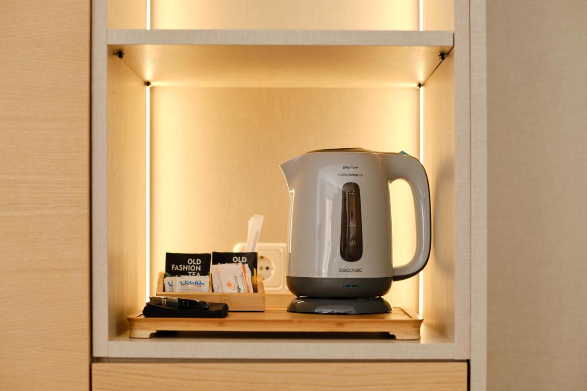 Una cocina o zona de cocina en Hotel Villa Chiquita - Adults Only - Over 12