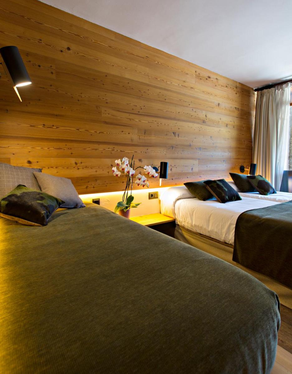 Cama o camas de una habitación en Hotel La Coma